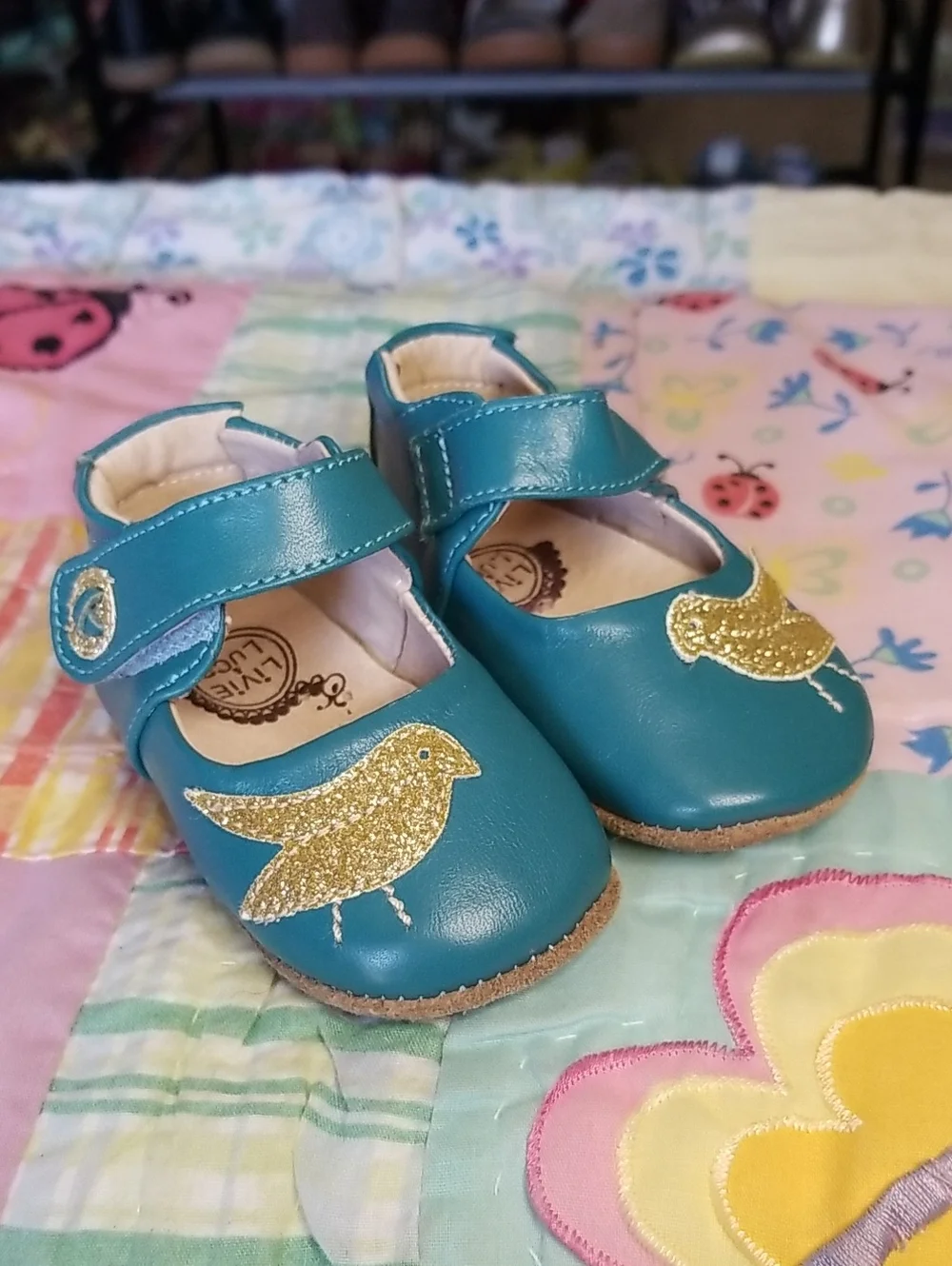 Livie & Luca Teal Leather Mary Janes with Gold Glitter Bird 0-6 Month Pio Pio